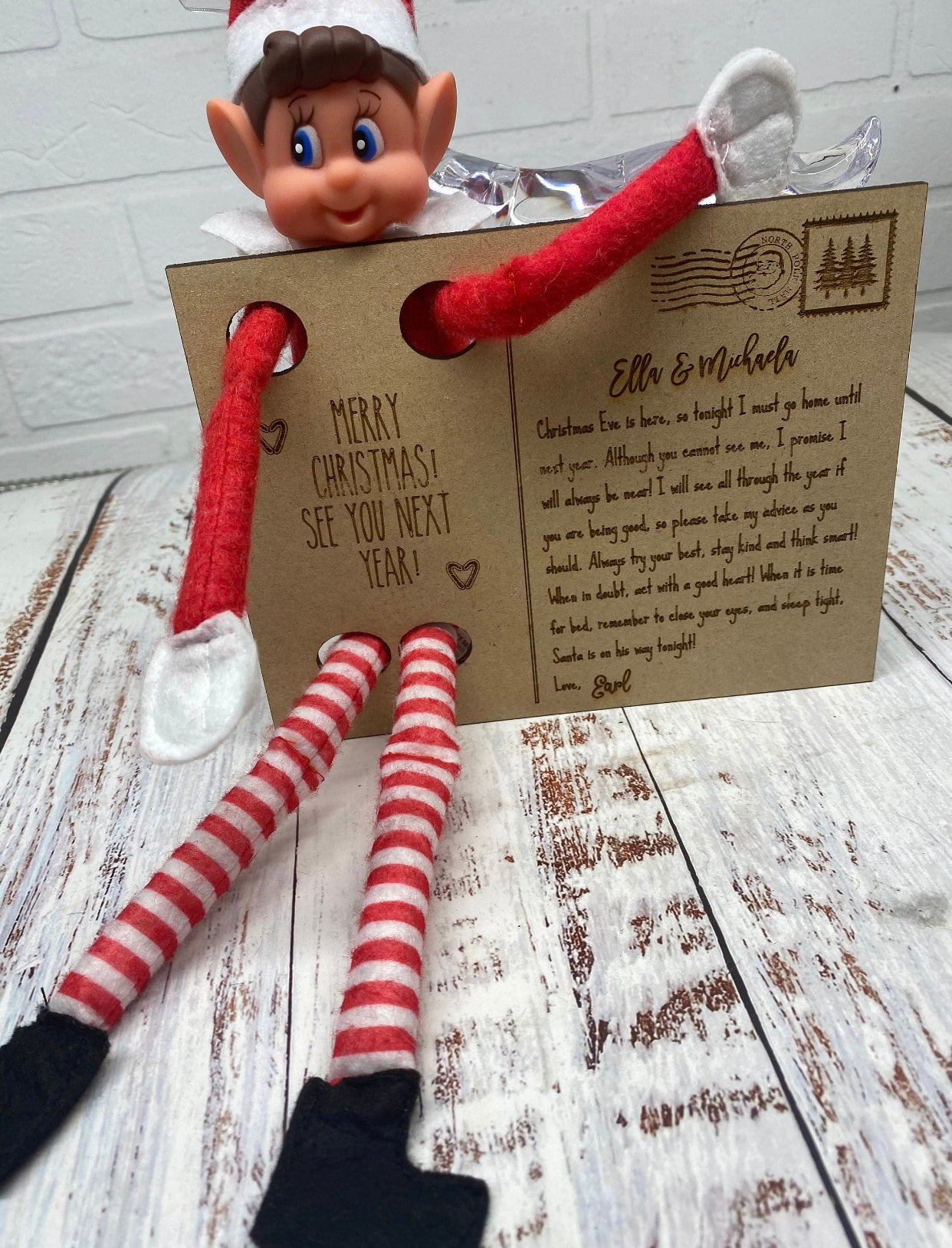 Elf return to North Pole postcard