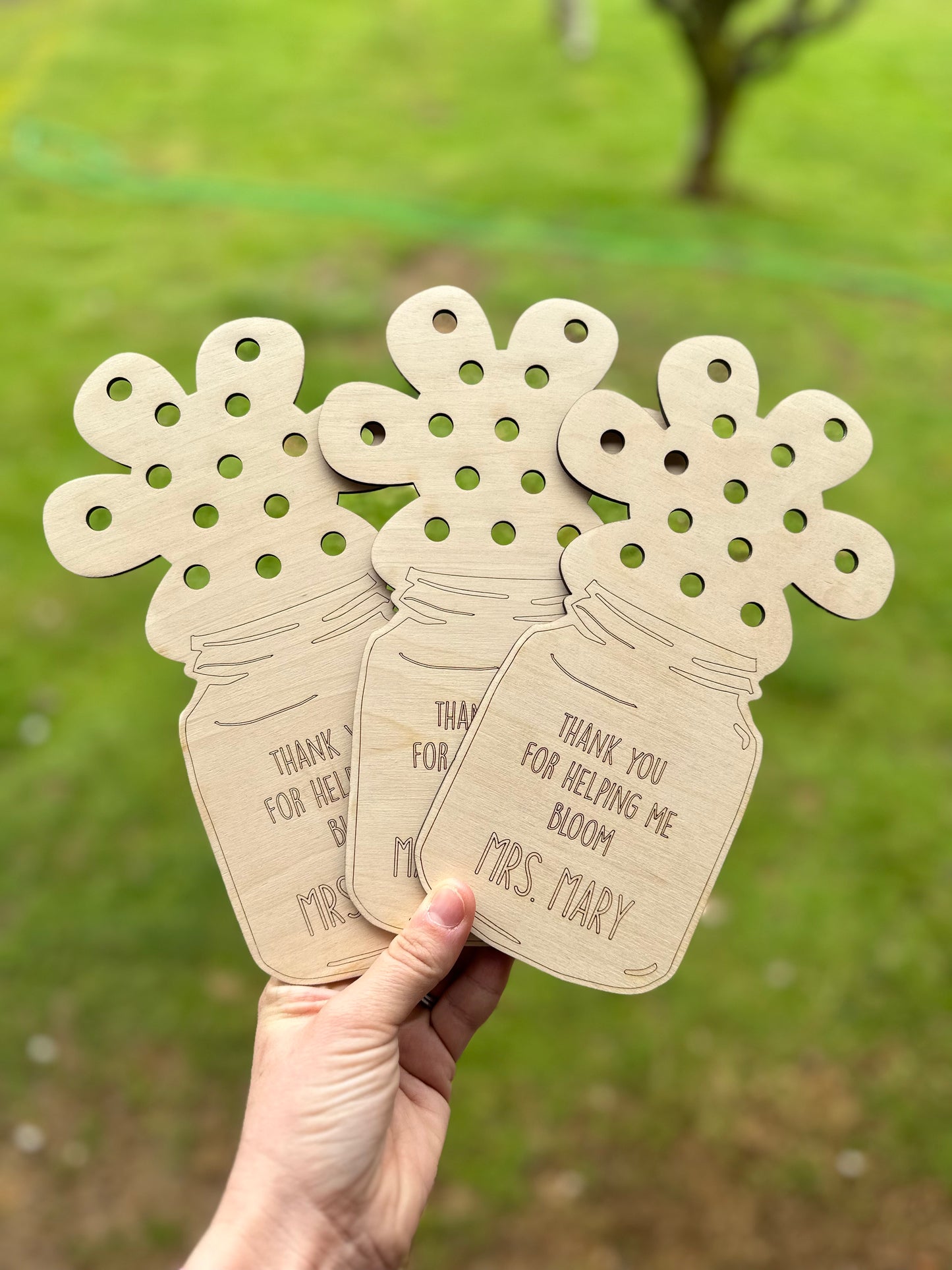 Teacher wooden flower holder